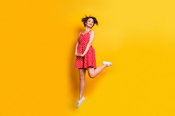 Full body photo of cheerful nice sweet girl jump enjoy spring time holidays wear good look clothing...