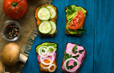 fresh vegetable vegeterian sandwiches  on the table