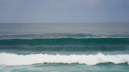 ocean waves. pipe wave in the pacific ocean. clear blue water. waves for surfing