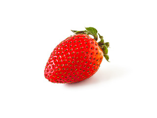 Ripe red strawberries with green leaves