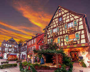 Traditional colorful house in Kaysersberg, Alsace, decorated at Christmas, France