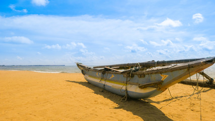 Beach scene with a fisher boat in Negombo, Sri lanka
