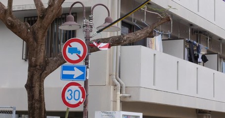 Japanese road signs in Tsuboya district is assocated with traditional ceramics like shiisa. Okinawa, Japan. 20-1-20