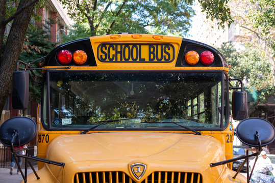 Front view of a typical American yellow school bus. Taken in New York City on October the 2nd, 2019