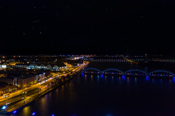 Fototapeta na wymiar Riga Cityscape Night Railway Bridge Latvia