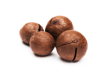 Shelled  macadamia nuts on white background