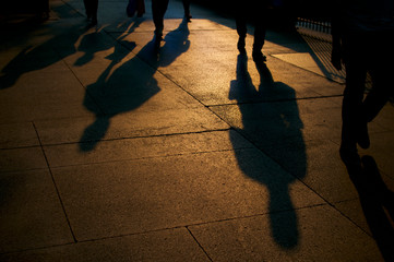 Shadows of walking people