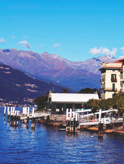 Fototapeta premium Italy Bellagio, mountains and pier