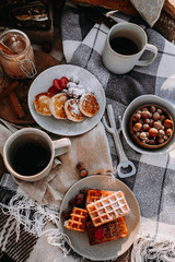 breakfast on a plaid, cheesecakes with waffles and coffee