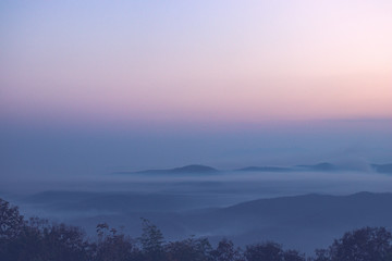 Layers of mountain with mist and twight light