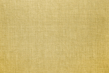 Golden linen fabric background or texture