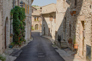 Fototapeta na wymiar A medieval picturesque street in Assisi, Italy