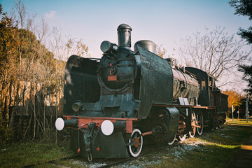 Naklejka premium Railroad history, old steam locomotive.