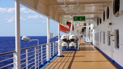 walk deck on a cruise ship. safety on the ship, lifeboat, liferafts, lifebuoys. liferaft station....