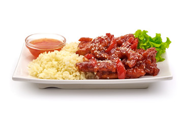 Kung Pao Chicken with rice prepared in wok, Chinese traditional food, isolated on white background