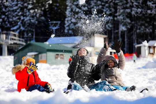 kids playing in snow