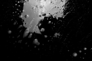 Soap foam, lather with bubbles isolated on black, with clipping path, texture and background, top view