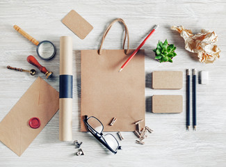 Photo of blank retro stationery set on light wood table background. Corporate identity template....