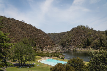 Fototapeta premium Launceston, Tasmania - January 3rd 2020: Stunning views of the swimming pool and First Basin at Cataract Gorge.