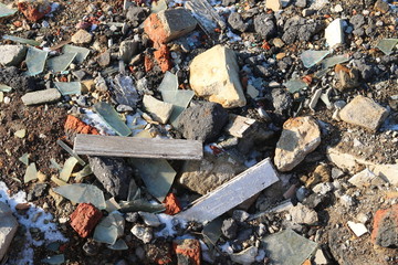 Construction waste with elements of various dismantled and destroyed old structures at municipal...