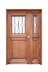 Wooden street door with glass panes with bars