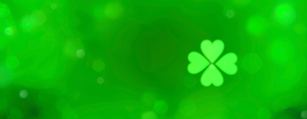 St. Patrick's Day - Abstract green background banner with bokeh lights