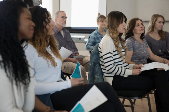 Women Listening At Town Hall Meeting