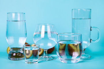 Glasses of different shapes with water