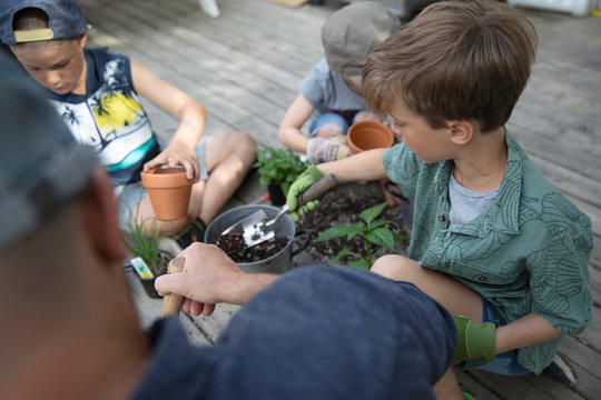 Father And Sons Potting Plants