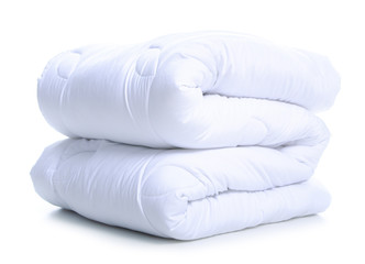 Fototapeta na wymiar Folded white soft warm blanket on white background isolation
