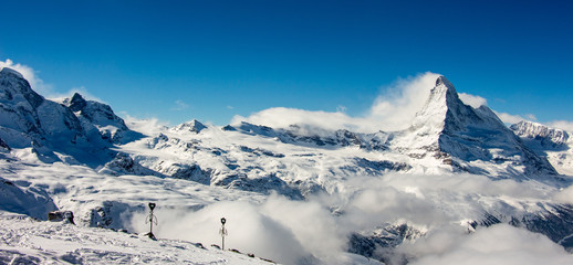 Zermatt Matterhorn gornergrat emerging from sea of clouds view perfect sky
