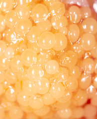 Fresh caviar in fish as a background