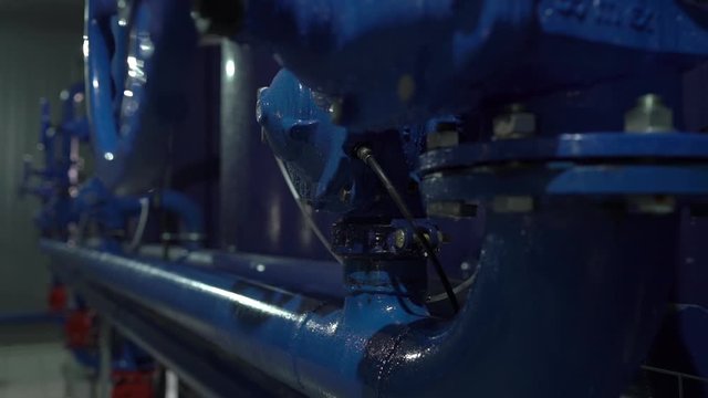 Connections industrial water pipes valve system equipment at the station of water supply and treatment smooth camera movement