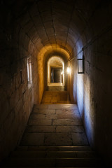 Narrow corridor in the Jerónimos Monastery or Hieronymites Monastery of Belém, in Lisbon, Portugal