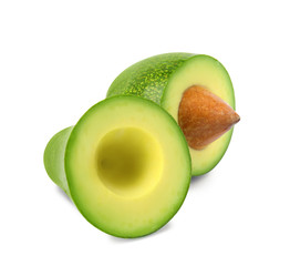 Cut tasty ripe avocado on white background. Tropical fruit