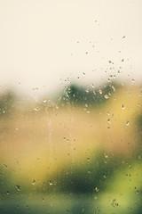 Raindrops on the glass, scenic view from the window