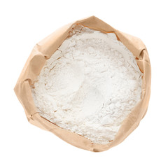 Wheat flour in paper bag isolated on white, top view
