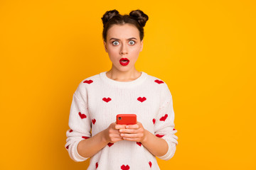Fototapeta na wymiar Portrait of her she nice-looking attractive lovely pretty glamorous mad angry worried girl using cell reading fake news isolated over bright vivid shine vibrant yellow color background