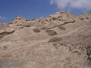 Whimsical relief, formed by weathering and erosion near the beaches of Vlychada. Santorini, Greece.