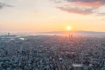 Naklejka na ściany i meble Skyline in Osaka, Sunset view of the Cityscapes