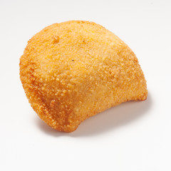 Rissole, a small patty enclosed in pastry, or rolled in breadcrumbs, usually baked or deep fried, filled with savory ingredients. Isolated on a white background.