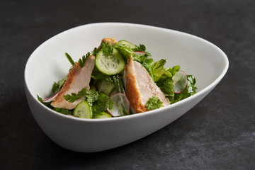 Farm chicken salad romaine lettuce and tarragon pesto, close-up