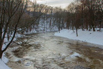 View of the river Vilnia in the park in Vilnius in winter. Lithuania