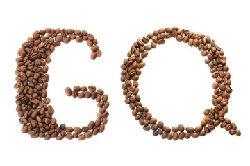Coffee beans. The inscription GQ from coffee beans on a white background. brown