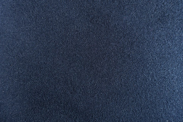 Fototapeta na wymiar Texture of simple navy blue jersey fabric