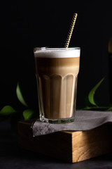 Coffee with milk froth dark and moody food photography