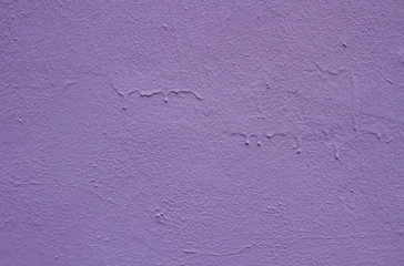 Beautiful purple textured stucco on the wall.