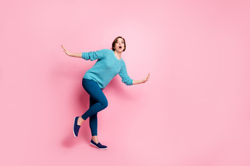 Fototapeta na wymiar Full length body size view of her she nice attractive lovely funky worried clumsy brown-haired woman having fun fooling pretending falling down isolated over pink pastel color background