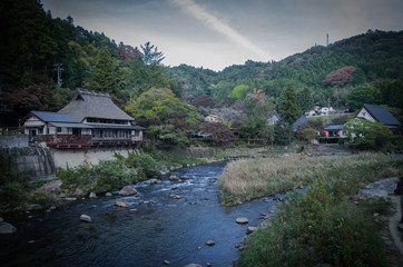 Fototapeta na wymiar house in the mountains with river view, Japan 