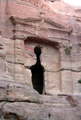 Sepulcher digged in red rock mountain, Petra